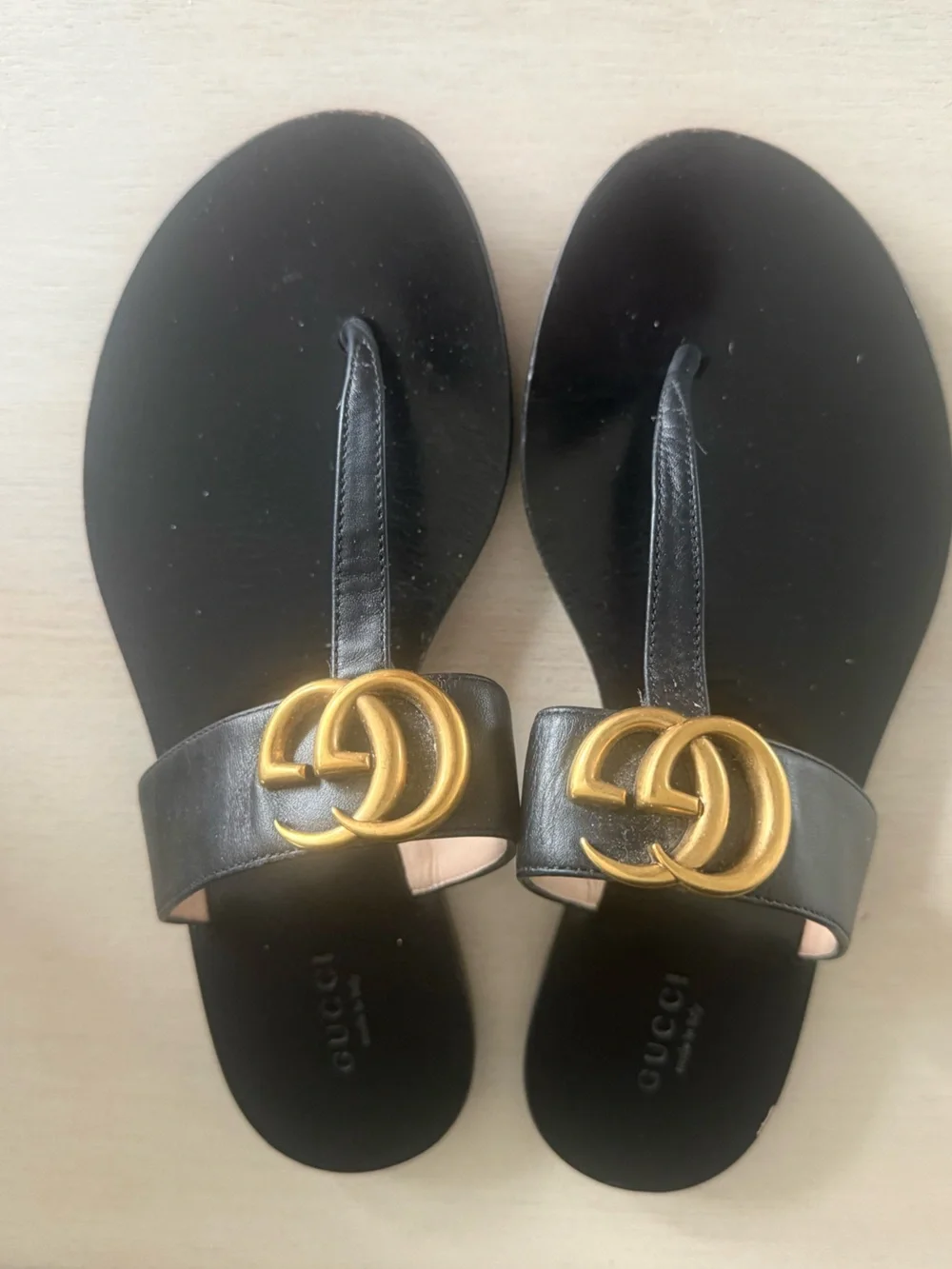 Authentic Gucci Black Leather GG Gold-Logo Thong Sandals